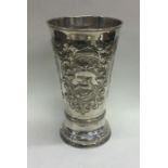 A large 18th Century Russian silver chalice embossed with animals and mythical creatures.