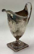 A George III silver bright-cut jug. London 1791.