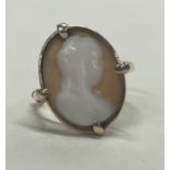 A 9 carat cameo ring in claw mount.