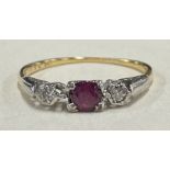 A small Antique ruby and diamond three stone ring in 18 carat mount.