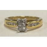 A good quality 18 carat gold and diamond fourteen stone ring in claw mount.