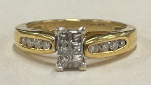 A good quality 18 carat gold and diamond fourteen stone ring in claw mount.