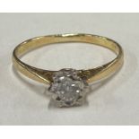 An 18 carat gold diamond single stone ring in claw mount.