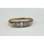 A small diamond five stone ring in 18 carat gold setting.