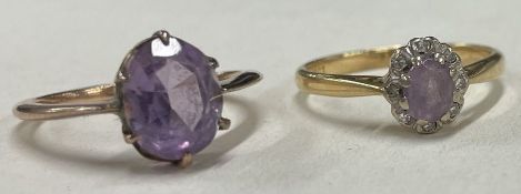 A small 18 carat gold amethyst and diamond cluster ring together with one other.
