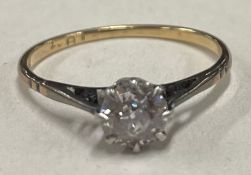 An Antique diamond mounted single stone ring in claw setting.