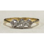 A small diamond three stone ring in 18 carat gold and platinum setting.