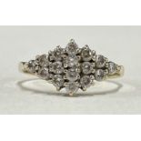 A small 9 carat nine stone cluster ring.