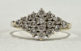 A small 9 carat nine stone cluster ring.