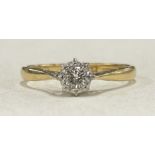 A small diamond single stone ring in 18 carat gold mount.