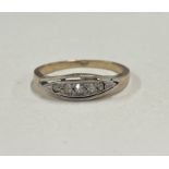 A Victorian boat shaped diamond five stone ring.