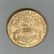 A USA Liberty head twenty dollar coin. Est. £1600