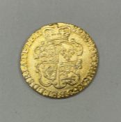 A 1782 George III Guinea. Est. £700 - £800.