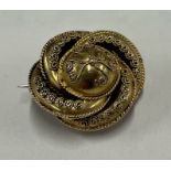 A Victorian 15 carat gold target brooch.