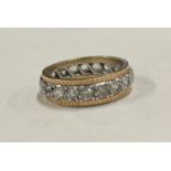 A paste set 9 carat full eternity ring.