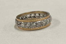 A paste set 9 carat full eternity ring.
