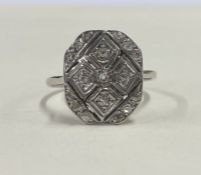 A good diamond cocktail ring with cut corners in platinum mount.