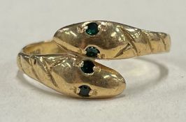 A small 18 carat gold double snake ring.