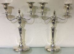 A large pair of Victorian silver candleabra. Sheffield 1893. By Harrison Brothers.