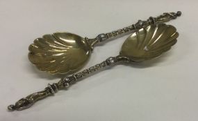 A good pair of cast silver gilt spoons. London. By H&H.