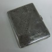 An Aesthetic Movement Victorian double sided silver card case. Birmingham 1880. By George Unite.