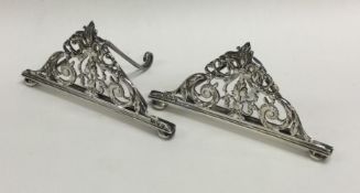 A fine pair of pierced silver menu holders. London 1890. By Sampson Mordan.