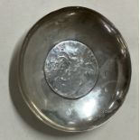 WANG HING: A Chinese silver dish with coin centre, the coin dated 1789.