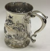 EXETER: A rare cased silver tankard decorated with flowers and leaves. 1753.