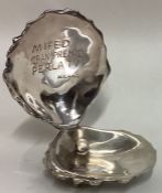 A rare silver trophy in the form of a pearl. Engraved 'Mifed Gran Premio Perla TV Milano'.