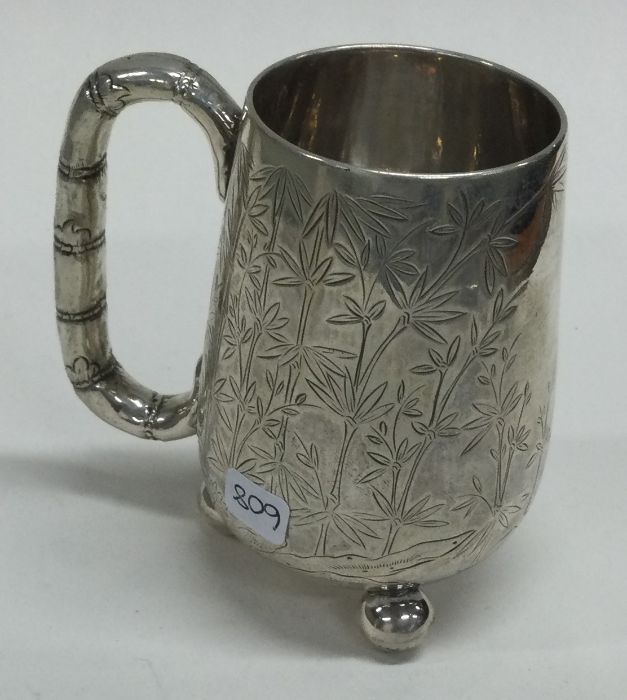 WANG HING: A 19th Century Chinese export silver mug. - Image 2 of 3