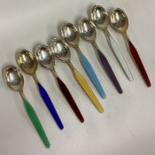 A set of eight silver and enamelled Norwegian spoons.