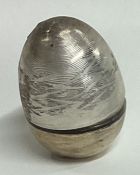 A heavy contemporary silver 'Surprise' egg. London 2000. By NP.