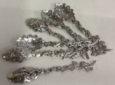 A collection of six mid-18th Century silver vine pattern spoons.