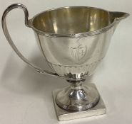 A good 18th Century Georgian silver fluted jug. London 1791. By Henry Chawner.