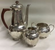LIBERTY & CO: An Arts and Crafts silver coffee set. Birmingham 1929.