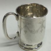 A silver christening mug engraved with swags. Birmingham 1929.