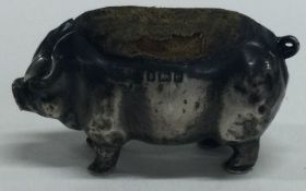 A silver pin cushion in the form of a pig. Birmingham 1904.