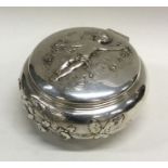 ED WOOLEN WEBER: A good circular silver and silver gilt tea caddy chased with figures and flowers.