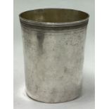 A heavy Russian silver beaker with engraved decoration. Marked to base.