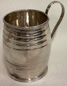 An 18th Century reeded silver christening mug. London 1798.