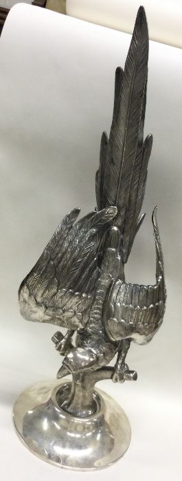 A large Continental naturalistic silver figure of a parrot bearing French import marks.