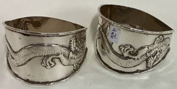 WANG HING: A fine pair of large Chinese export silver napkin rings. Circa 1900.