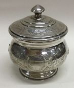 A Russian 19th Century silver biscuit box with pull off lid engraved dated 1896. Marked to base.