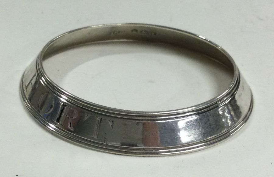 An 18th Century silver wine collar for 'Port'. London 1794. By RP.