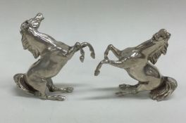 A pair of Victorian silver figures of horses. By Edward and John Barnard.