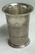 A Chinese engine turned collapsible silver beaker.