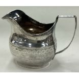 A George III silver jug. London 1801.