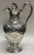 A Victorian silver wine jug. London 1857. By William Hunter.