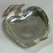 TIFFANY & CO: A silver dish in the form of an apple.