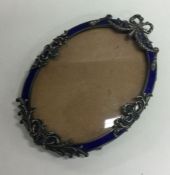 A Victorian silver and enamelled frame with swag decoration bearing import marks. London 1896.